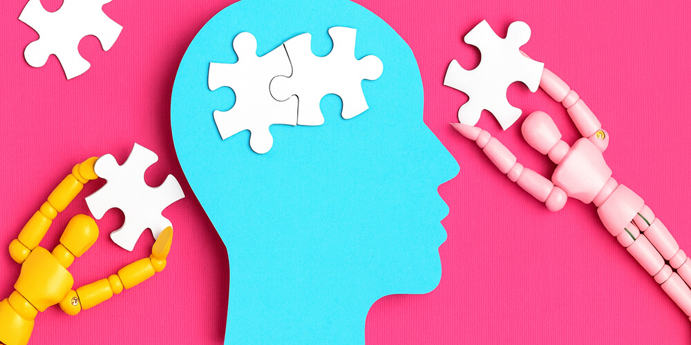 Illustration cerveau humain en puzzle, symbolisant mémoire, santé mentale et développement cognitif